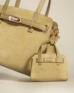 Dune London DefineXS 49 GBP khaki suede micro bag charm www.dunelondon.com campaign shot