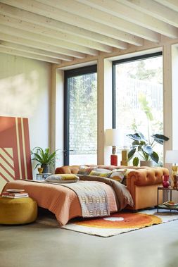 DFS Belair three-seater sofa bed in orange sensual velvet