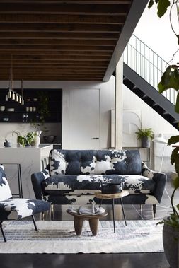 DFS Vegan Larch three-seater sofa in black cow Vegan Accent fabric, with DFS Vegan Cherish accent chair in black cow Vegan Accent fabric