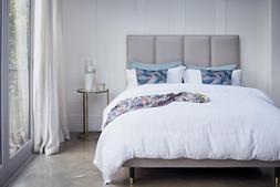 Furniture Village – Hypnos Bed &pound;949, Edna Nest of Tables, &pound;169, The Lounge Co. Pair of Small Scatter Cushions, &pound;89 (2)