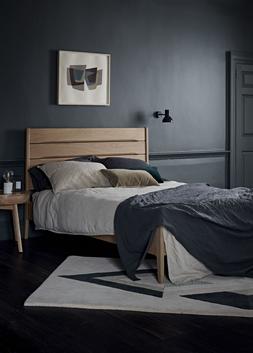 Furniture Village - ercol Rimini Double Bed, &pound;939, Lista Smart Side Table, &pound;349, Michelle Collins Rug, &pound;399