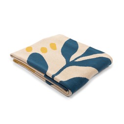 Knitted Jacquard throw, leaves print