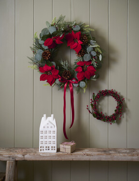 Wire Wreath Frame 30.5cm £3.50 Natural Sundries 58 Pieces £11.00 Sala Leaf Spray 83cm x 15cm £3.50 Green Sword Fern 43cm £5.00 Pinecones 200g £4.50 Scarlet Red Satin Ribbon 20mm x 15m £1.50 Mache Square Boxes 3 Pack £6.00 Red and White Cotton Twine 100m £4.50 from Hobbycraft