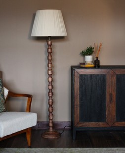 Wood floor lamp with neutral pleated shade