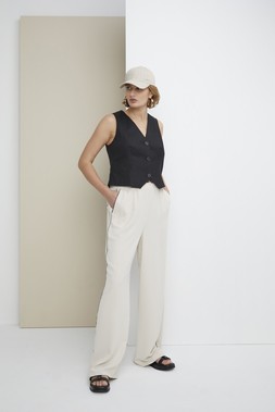 Beige Linen Look Cap &pound;8, Black Linen Waistcoat &pound;22, Cream Side Stripe Trousers &pound;20, Black Platform Sandals &pound;20