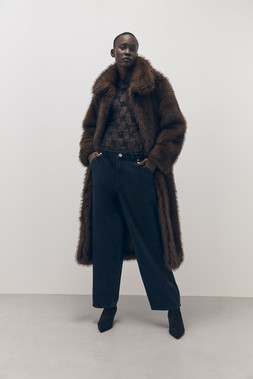 Tu-AW26-Model-21 - Brown Longline Faux Fur Coat £55, Chocolate Lace Second-Skin Long Sleeve Top £10, Dark Denim Balloon Jean £22.50, Black Wedge Ankle Boot £30