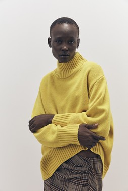 Tu-AW26-Model-31 - Yellow Premium Lambswool High-Neck Jumper, £35  Brown Paleo Check Skirt, £28 