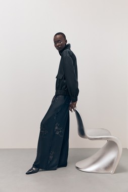 Tu-AW26-Model-55 - Satin Bomber Jacket £35, Pleated Trousers £28,  Ankle Boot £28 