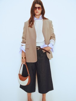 M&S Blazer £60, Goodmove Sweatshirt £30, M&S Shirt £18, M&S Trousers £38, Sunglasses £16, Belt £16, Bangles £35, Rings £12.50,£14,£12.50, Bag £26, Shoes £28
