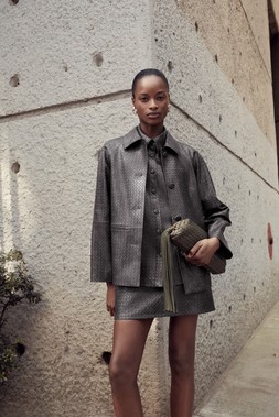 M&S Collection Textured Faux Leather Jacket £60, Faux Leather Woven Mini Skirt £32, Faux Leather Woven Shirt £35, Woven Bag £36
