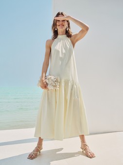 M&S HALTER DRESS £49.50, FLORAL BAG £49.50, SHOES £45, EARRINGS £15